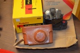 (3) Vintage cameras to include Argus & Polaroid