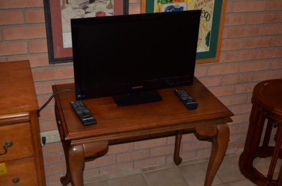 24 in. Hitchi flat screen T.V. & modern end table