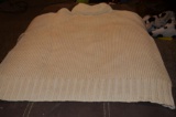 Hand knitted cream colored turtleneck sweater