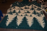 Hand knitted green and white Christmas sweater