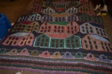 Hand knitted sweater vest with houses