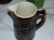 Grapevine pottery pitcher