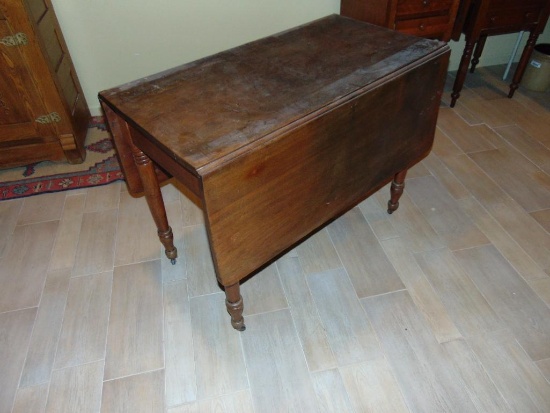 Antique drop leaf wooden table
