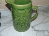 Green pottery pitcher