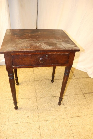 Early single draw stand table on skinny legs