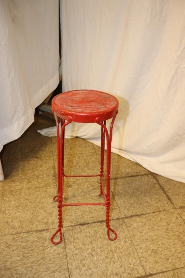 small ice cream style bar stool in red paint