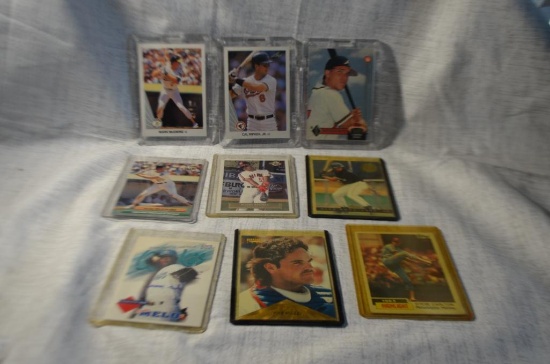 Cards 9 Baseball (2) McGwire, (1) Jones , (1) Ripkin Jr, (1) Melo, (1) Ramirez, (1) Rodriguez, (1)