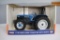 Ertl New Holland 7740 Row Crop Tractor with Rops 1/16 Die-Cast