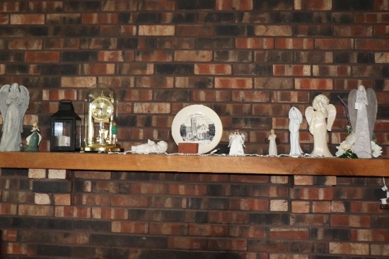 Contents of fireplace mantle, including Nauvoo brick, plate, clock and more