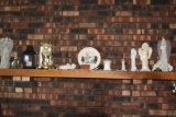 Contents of fireplace mantle, including Nauvoo brick, plate, clock and more