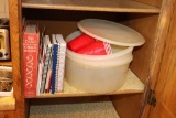 Contents of Cabinet including Tupperware and cookbooks