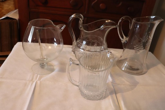 Quantity of clear glass pitchers
