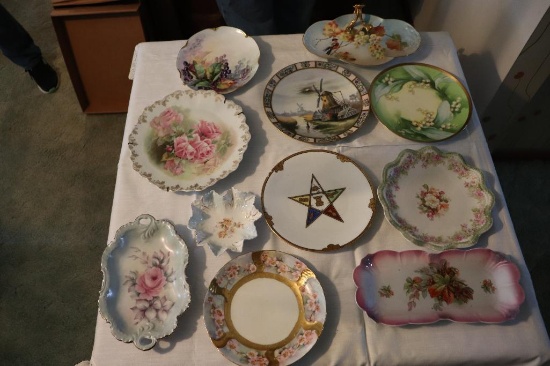 Quantity of hand painted vintage plates