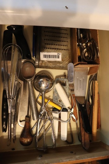 large quantity of kitchen utensils