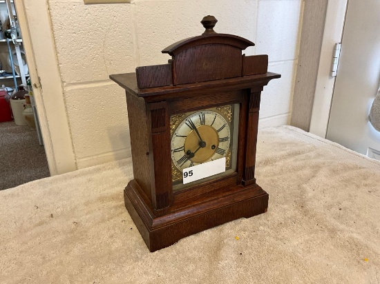 unmarked oak mantle clock