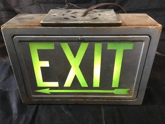 Green Exit sign, electric, lights up