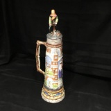 Tall decorated ceramic beer stein with handle & top