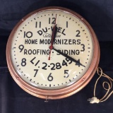 Clock, Du-Well Home Modernizers, Roofing, Siding, electric, turns on