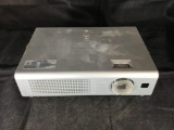 Hitachi 3LCD CP-RS57 Multimedia Projector. No power cord. Has bulb. Powers on.