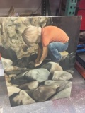Boy on rocks appears to be oil on canvas signed by leon barnard 1974