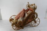 Doll in Wood Stroller