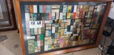 Collection of various Matchbook covers pinned to large board 50 wide 35 tall