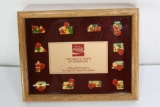 Collectible Framed Glass Coca Cola Twelve years of Christmas Coke Xmas Pins.