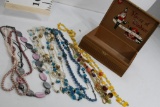 Various Fashion Necklaces in a Wooden Box.