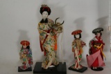 Japanese Ceramic wooden Dolls size varies 7-14 inches. 4 Units