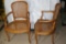 Pair Two wooden sitting chairs possibly antique with weave woven backs