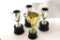 Trophy Collection Gold & Silver Colored with wooden base approx size 10-12 inches. 4 units