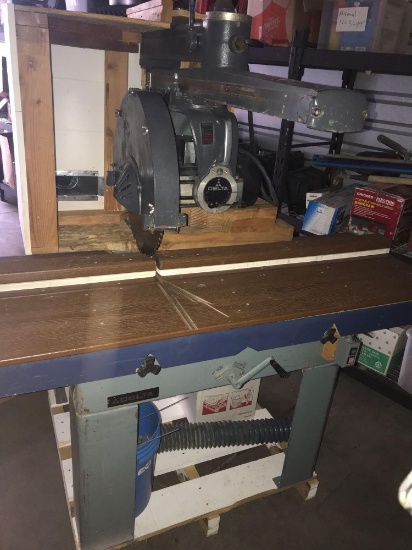 Delta 5 HP, 3 phase with a 20? blade Blade Radial Arm Saw Mounted Work Table Powers on and Runs
