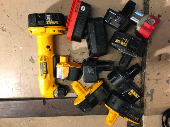 bag of batteries and a drill- DEWALT