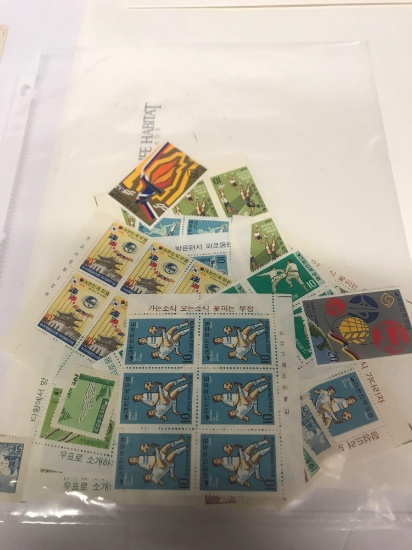 100 Block Korea Stamp Sheet & Bag of Stamps 2 Units