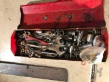 Metal tool box with wrenches and sockets