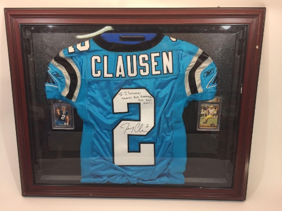 Framed Signed Jersey Says Jimmy Clausen 28in x 35in