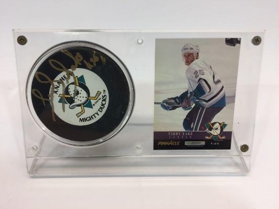 Terry Yake Card & Signed Hokey Puck - Signature is Unauthenticated