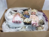 Box of various Dolls, mostly Precious Moments Dolls