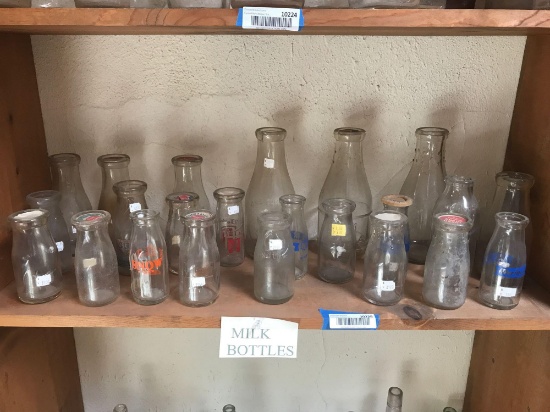 Shelf of Vintage Milk Bottles 23 Units