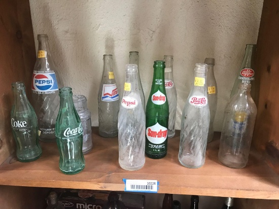 Shelf of Vintage Soda Bottles 13 Units