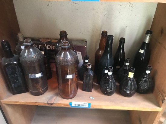 Shelf of Vintage Amber Bottles 17 Units