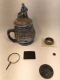 Jar, belt buckle, bracelet, Buffalo five cent coin, Magnifying glass, etc