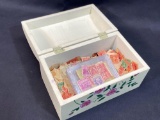 Jewelry box filled with vintage US stamps