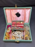 Jewelry box with necklaces, pins, earrings, bracelets, etc