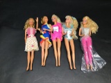 Various Barbie dolls