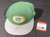 Green Bay Packers NFL Cap w/ COA that says signed by Aaron Rodgers