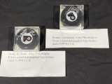 2 Signed NHL Hockey Pucks in Display Cases with Topps stickers