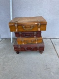 Stacked wooden suitcase drawers