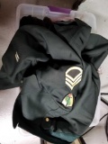Bin Full of Army Uniforms Pouches Pins