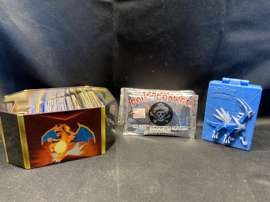 Pokemon tin with 7 poison pawg bone breaker slammer packs